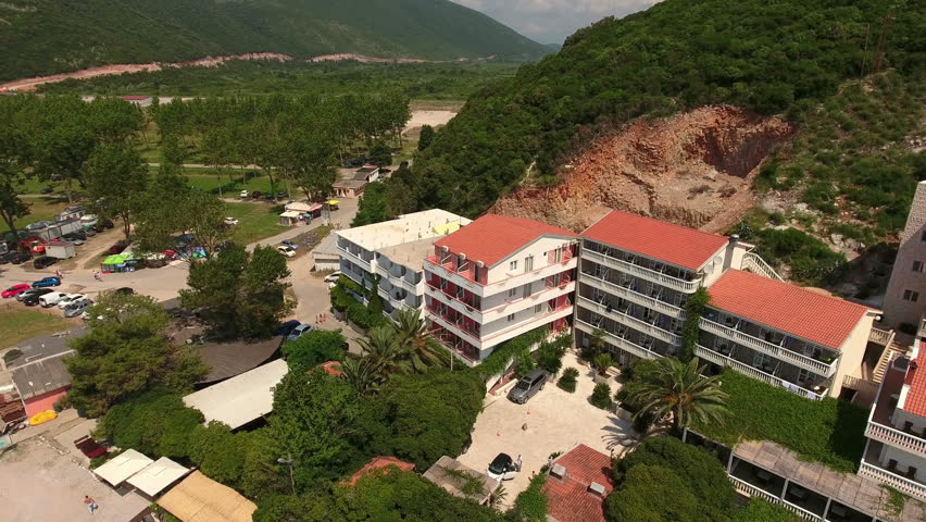 Hotels are on the mountain over Jaz beach. Jaz is a popular place for sunbathing and camping in Montenegro