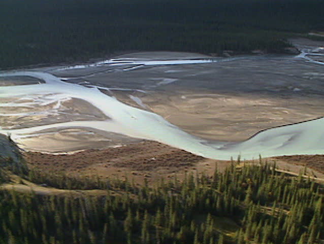 Aerial flight over Saskatchewan River in the Rocky Mountains