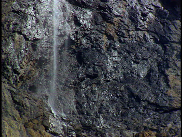 Small waterfall and rockface