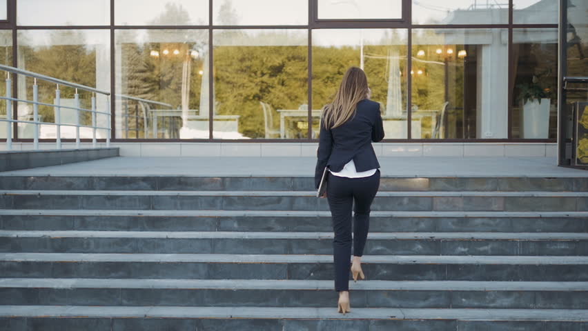 Young Business Woman Walking up Stock Footage Video (100% Royalty-free