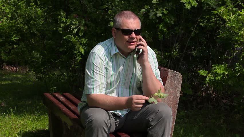 Man talking on the phone and enjoy nature