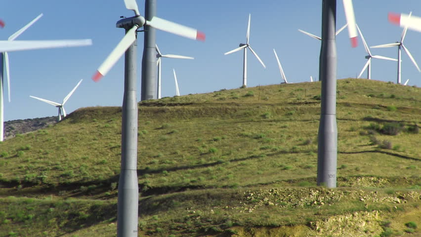 Wind Power Turbines Green Hills and Blue Sky