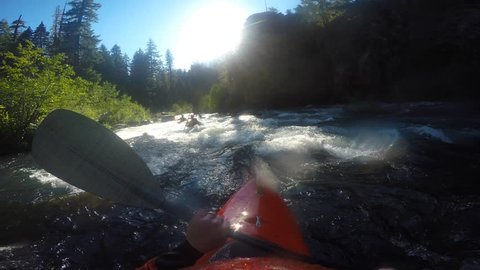 Man kayaking Natural Bridge section of the Rogue River in Southern Oregon