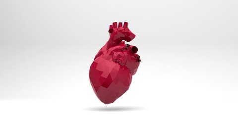 The red polygon heart beats. Computer three-dimensional graphics. Slow rotation of the object.