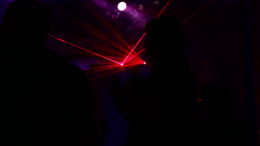 Dancing at the disco. People dancing at a disco where there is a beautiful laser show. | Shutterstock HD Video #1781075