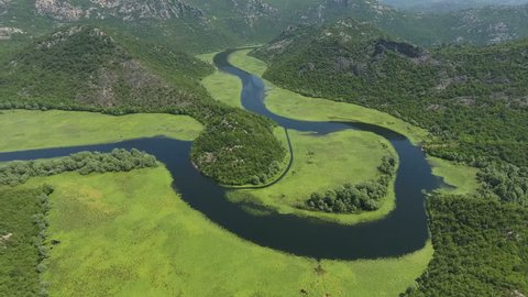 Watercourse bend of river Rjieka Crnojevica. Beauty nature in mountains. Part of Skadar lake and national park. Montenegro