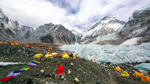 Everest Base Camp colored tents, at an altitude of 5,364 metres (17,598 ft). These camps are rudimentary campsites on Mount Everest that are used by mountain climbers during their ascent and descent.