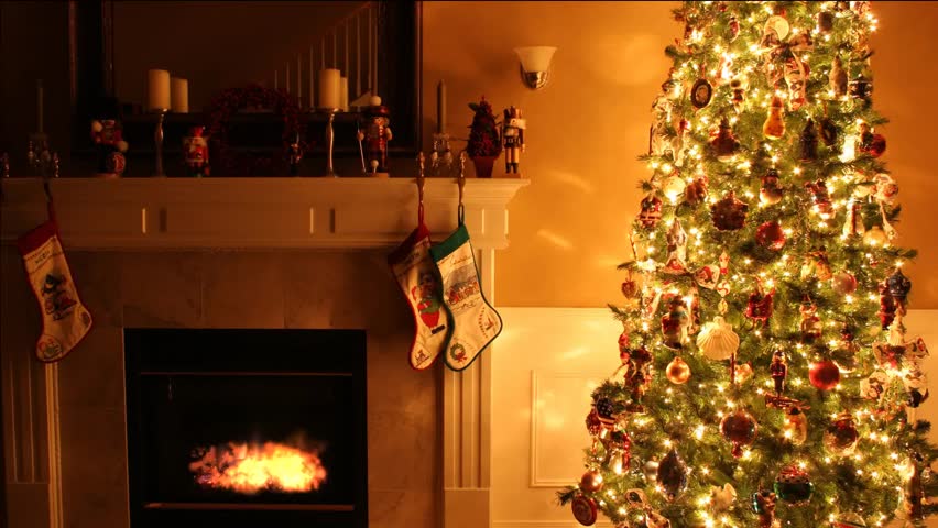 Merry Christmas beautiful video with animated fireplace, Xmas tree with garland, pleasant atmosphere and luminous fire. Best use for Xmas gifts and titles with a greeting inscription.