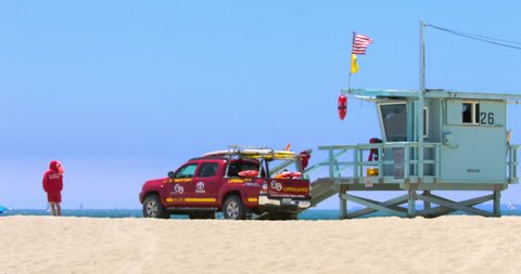 LOS ANGELES, CALIFORNIA, USA - JULY 3, 2016: Lifeguard truck on duty during the heat wave, heat distortion on purpose on July 3, 2016 in Santa Monica, Los Angeles, California, 4K, from RAW, EDITORIAL