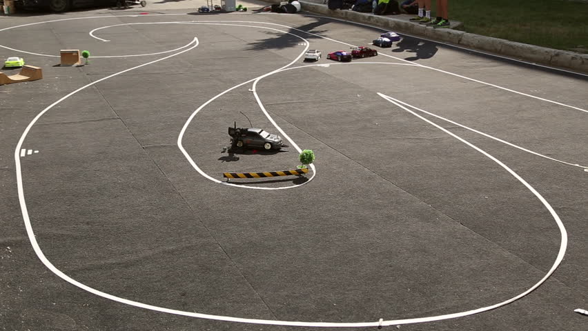 NOVOKUIBISHEVSK, SAMARA REGION/RUSSIA - JUNE 25: Drift RC models, radio control drift, two small RC cars going around the track on June 25, 2016 in Novokuibishevsk