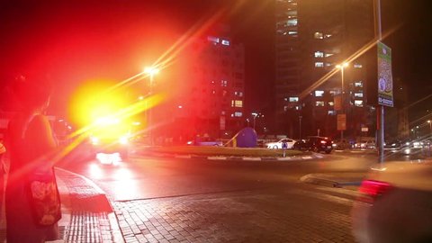 Tel - Aviv, Israel - June 30, 2016: An ambulance drives down the street with the emergency lights on. With the sound of sirens.