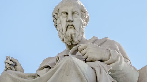 Closeup Marble Statue of the Ancient Greek Philosopher Plato on Sky Background