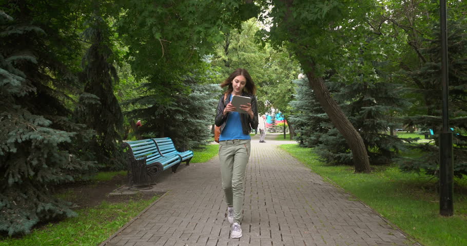 girl walking in the park