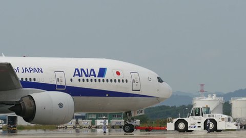 ANA ALLNIPPON AIRWAYS BOEING B777 JA706A at HIROSHIMA AIRPORT JAPAN - May 12, 2014