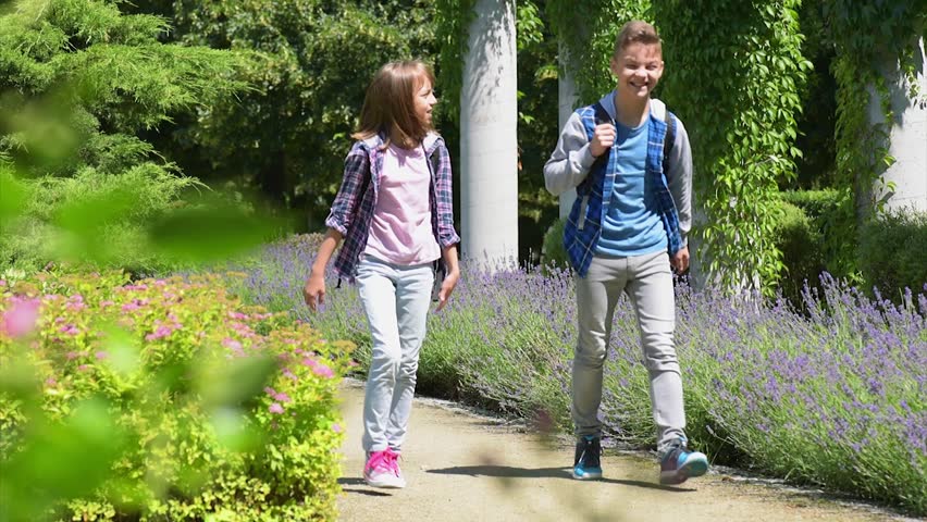 boy and girl walking