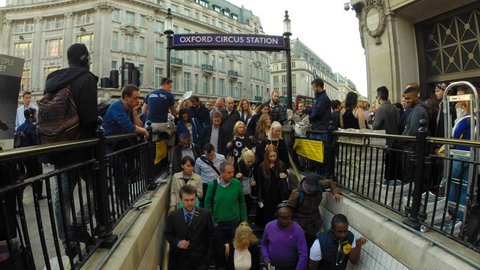 Oxford Circus, London, Summer 2016. The tube station at Oxford Circus is flooded every day with commuters on their way home after work, the station entrance struggles to cope with the volume of people