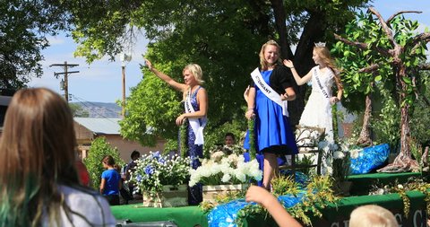 MORONI, UTAH - 4 JUL 2016: 4th July Parade Spring City Royalty Float. Fourth of July, American celebration for freedom in small rural town. Parade. Patriotic school bands, floats and fire trucks.