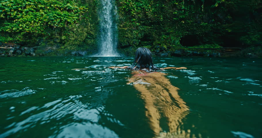 Young Woman Swimming Under Jungle Stock Footage Video (100
