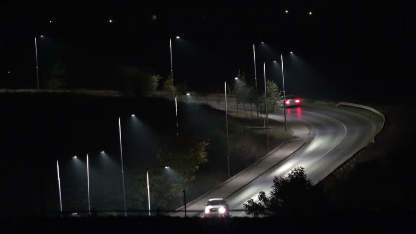 Aerial View of heavy traffic jam highway, Timelapse of driving & cars racing by with streaking lights trail at night