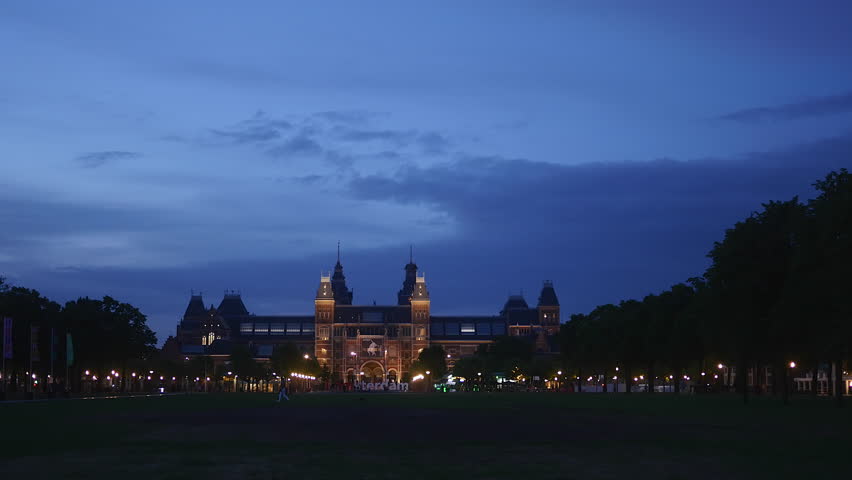 Pushing supermarket cart past through aisles containing breads and fruit. Perspective shot.