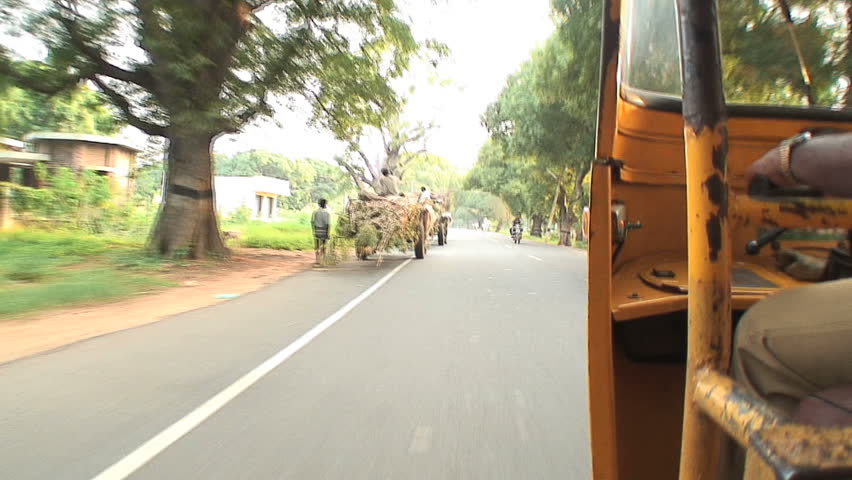 Traveling chepaly in a rickwaw in Pondicherry, India