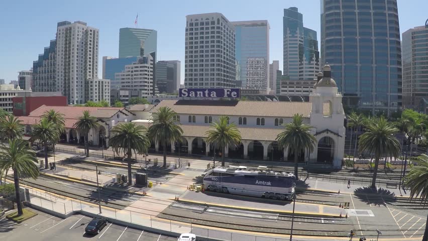 San Diego train station with buildings in the background.