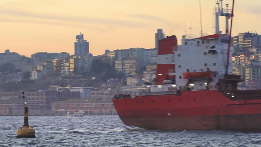 Side view of large cargo ship sailing at Bosporus Sea, Istanbul 