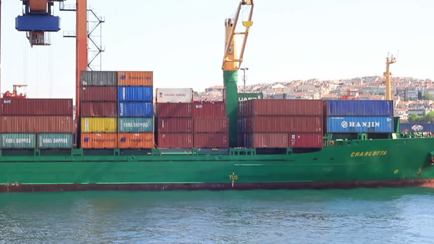 ISTANBUL - MAY 23: Container ship Charlotta unloads Chinese export goods on May