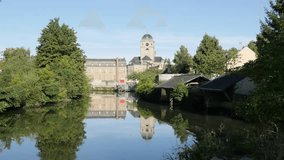 Sarthe river and basilique Notre Dame by the day located in lower Normandy France 2160p UHD footage - Gothic architecture building in French town of Alencon  4K 3840X2160 UHD video