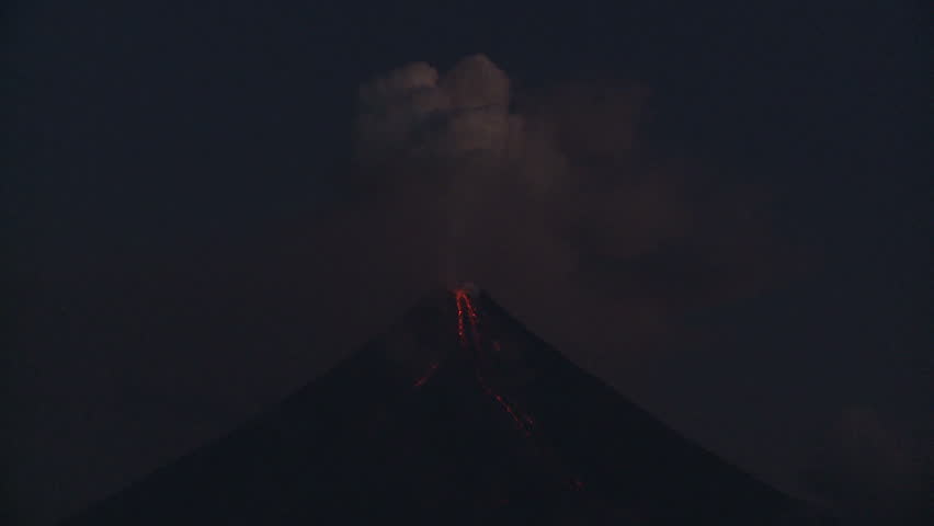 Mayon volcano erupts at dawn
