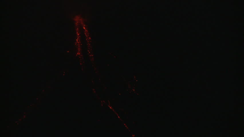 Lava Pours From Active Mayon Volcano At Night