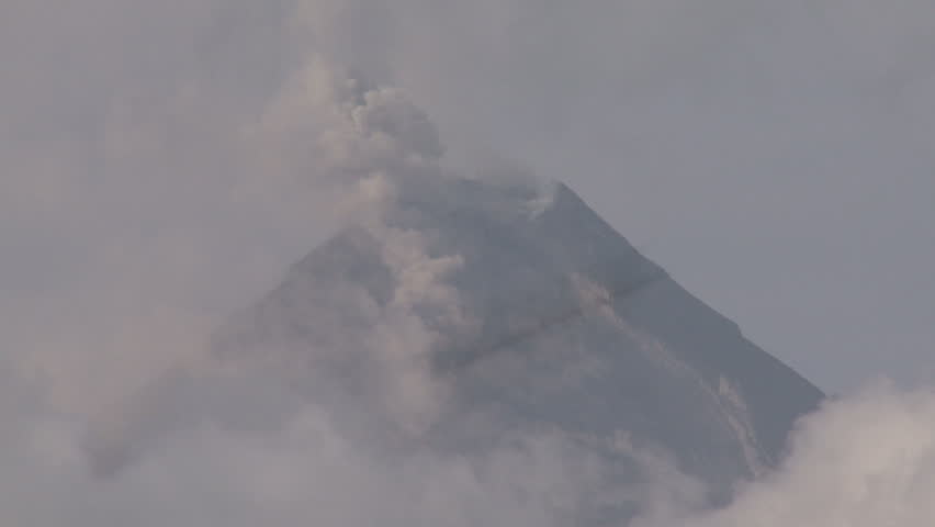 Ash Erupts From Crater Of Mayon Volcano