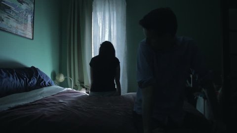 Tension between couple in the bedroom (darker)