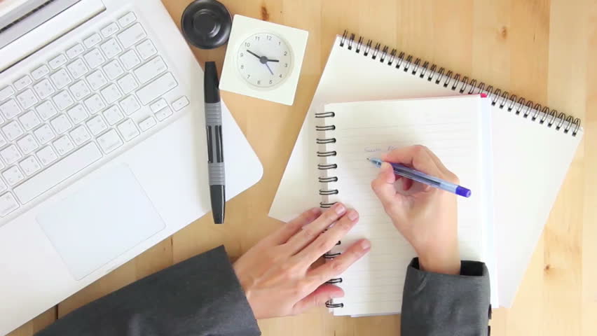 Businesswoman Writing On Notebook and Stock Footage Video (100% Royalty-free) 17941633 | Shutterstock