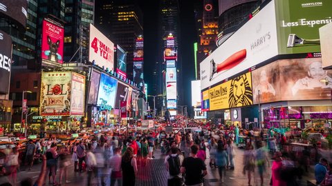 New York, USA - July 5: Night time lapse view of Times Square, famously adorned with flashy billboards and advertisements, in Manhattan, New York City, United States.