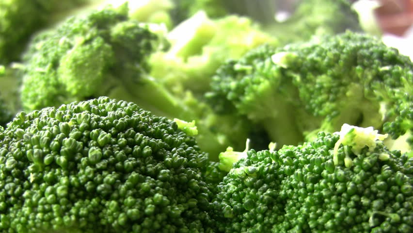 organic broccoli heads boiling bowl Stock Footage Video (100% Royalty ...