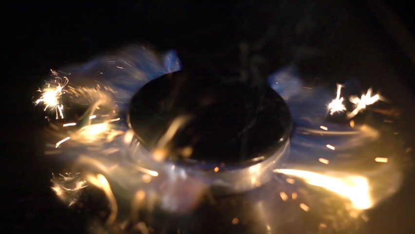 Create sparks by flint from a set of survival is ignited gas on the stove on the black background. S-log - High Dynamic Range. Several options color correction. Slow motion, high speed camera, 250fps