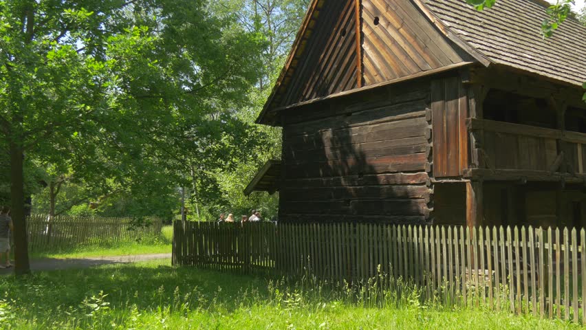 Polish Architecture, Students on Excursion, Old Wooden House in the Summer Sun, Beautiful Wooden Architect House With a Front Garden, Original Old House of Past Centuries, European Traditional