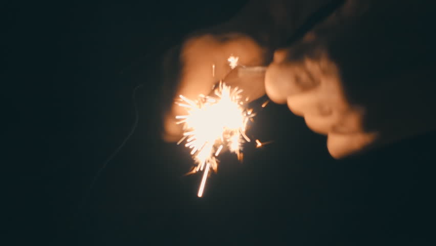 Create sparks by flint from a set of survival on the black background. S-log - High Dynamic Range. Slow motion, high speed camera, 250fps