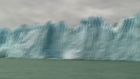 Ice Burg Falling Into Water, Perito Moreno Glacier