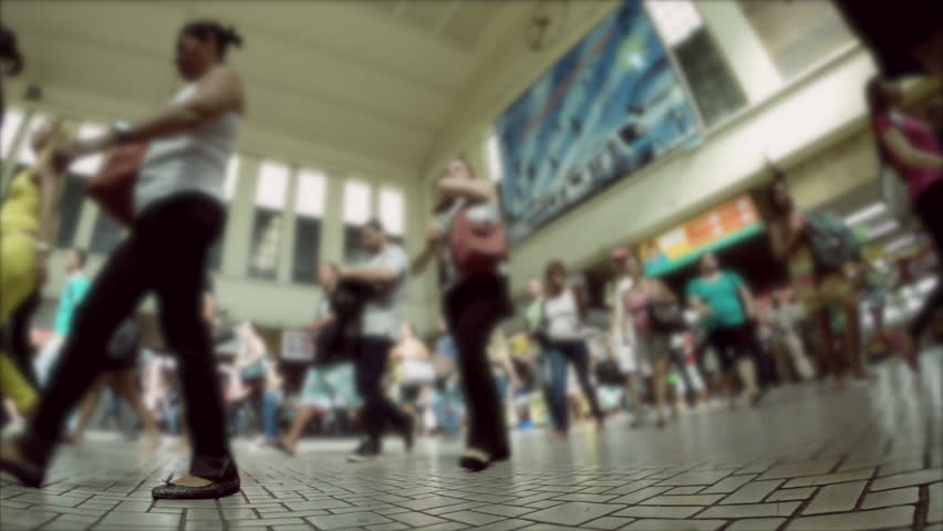 Crowds of unrecognizable commuters walking through Central Station in Rio de Janeiro at rush hour      