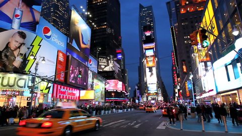 NEW YORK CITY - MARCH 23: Timelapse of Times Square traffic at dusk, March 23, 2011 in New York City. Times Square has become an iconic symbol of New York City and the United States.