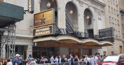 NEW YORK - Circa July 9, 2016 - People wait in line for tickets to the final performance of Hamilton starring Lin-Manuel Miranda.  	