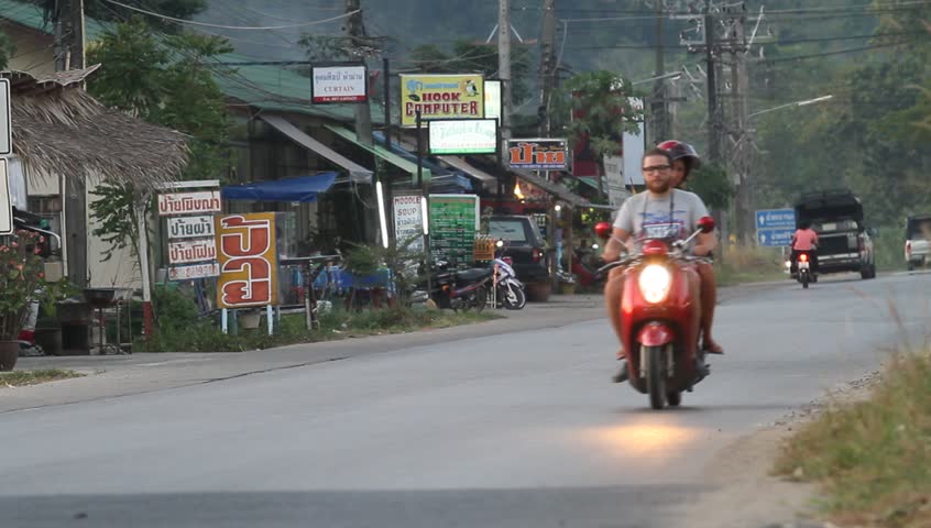 KO CHANG, THAILAND - DECEMBER 12: Traffic on the ring road of the island of Ko