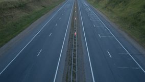 Cars moving on the highway. View from above. Sunset Dawn. Dusk. twilight.  time-lapse
