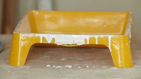 using a paint roller Close-up