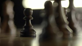 Two clips with moves during a chess game where pawns are taken