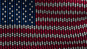 Flag of USA, consisting of many soccer balls fluttering in the wind, on a black screen. Colored soccer balls forming fabric flag. Looped video.