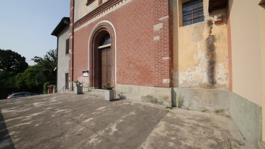 in italy  osmate  ancient   religion  building    for catholic and clock tower
