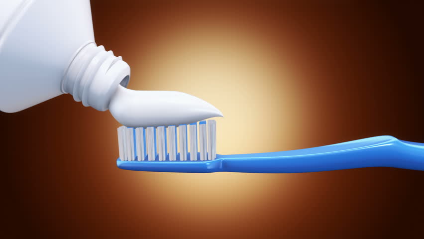 toothpaste on brush